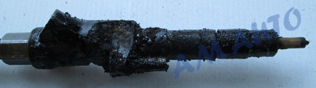 Removed injector
                      flooded with black glop from axhaust gasses
